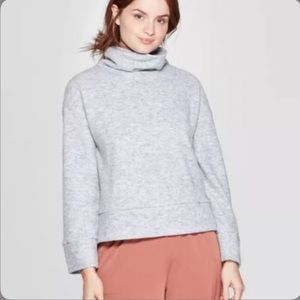 Cozy beige turtle neck sweater